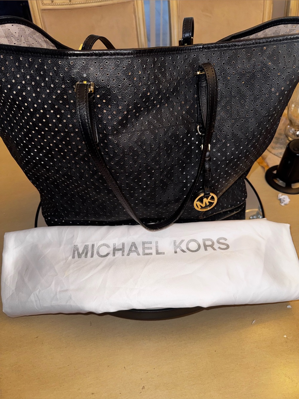 Michael Kors Black Perforated Tote with Gold MK Charm
